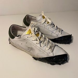 golden goose taped sneakers